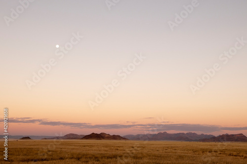 Sunset over Kulala Wilderness Reserve, Namib Desert, Namibia photo