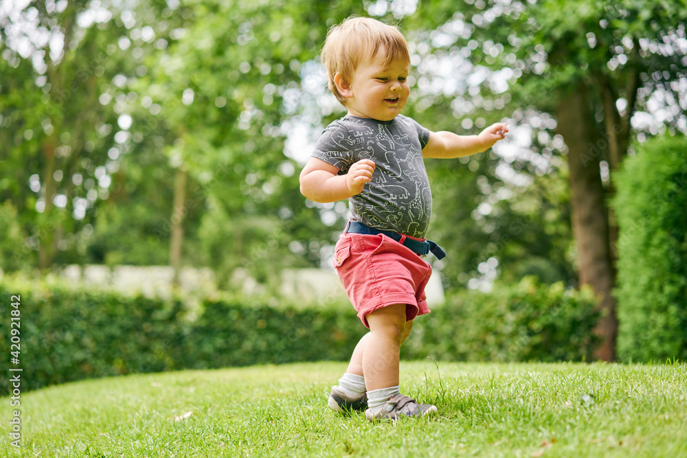 Toddler exploring park Toddler exploring park