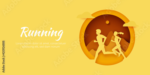 Male and Female running in nature mountain landscape.Marathon or Trail running,outdoor sport activity.