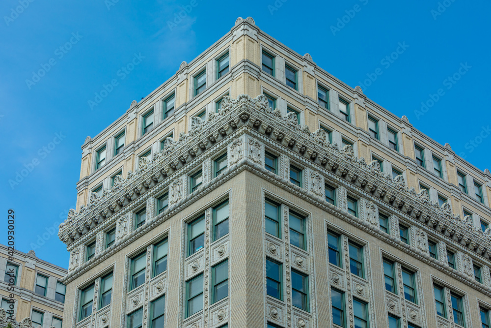 Washington, DC, USA - 29 June 2020: Beautifully decorated Facade of a historic Apartment Building