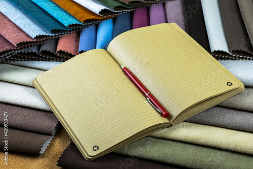 a notebook made of environmentally friendly materials for recording designer notes on furniture textiles