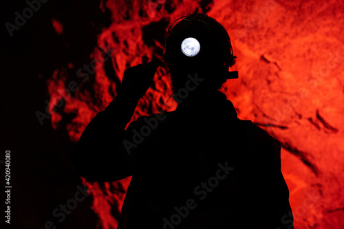 miner underground silhouette dark red worker mining
