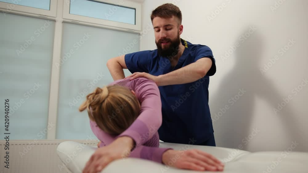 Chiropractic adjustment. Woman suffering from neck pain. Professional massage Chiropractic adjustment. Woman suffering from neck pain. Professional massage