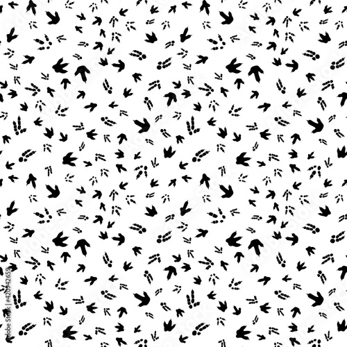 Dinosaur footprint tracks. Minimal seamless pattern. Background with paw, claw predator. Dinosaur footprint illustration perfect for textile, wrap and wallpaper and design.