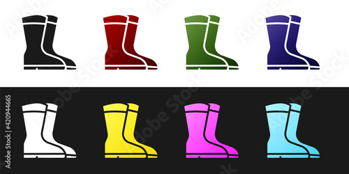 Set Fishing boots icon isolated on black and white background. Waterproof rubber boot. Gumboots for rainy weather, fishing, hunter, gardening. Vector