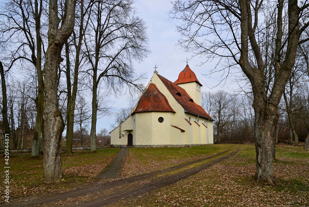 built at the beginning of the 20th century in an eclectic style, a Catholic church dedicated to the Blessed Virgin Mary, the mother of the church in the village of Baranowo in Warmia and Masuria in Po built at the beginning of the 20th century in an eclectic style, a Catholic church dedicated to the Blessed Virgin Mary, the mother of the church in the village of Baranowo in Warmia and Masuria in Po