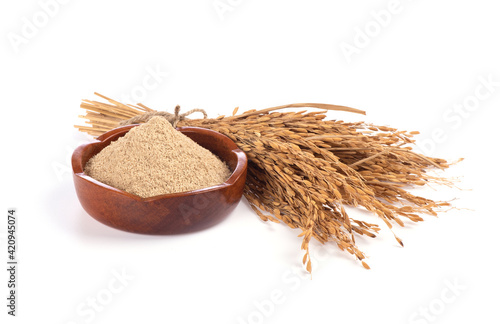 Photos Rice bran and ear of rices isolated on white background.