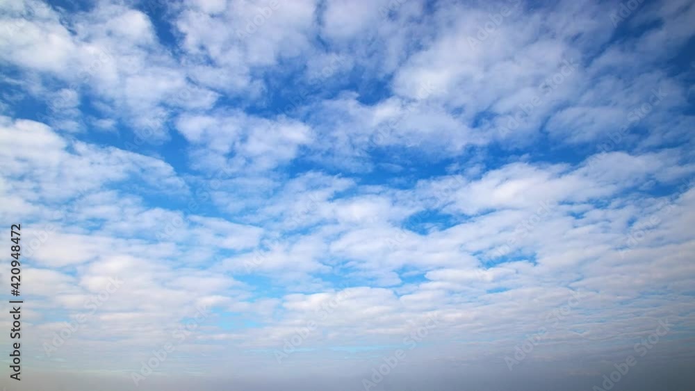 Blue sky and cirrocumulus clouds, time-lapse Blue sky and cirrocumulus clouds, time-lapse
