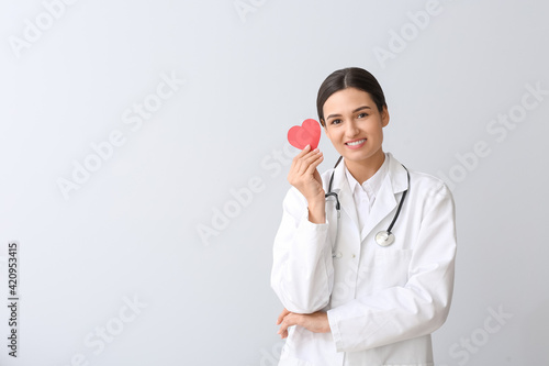 Cardiologist with red heart...