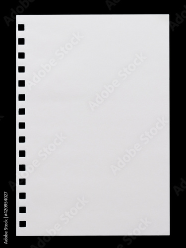 Slika na platnu a sheet of white paper with a perforation from a notebook, isolated on a black b