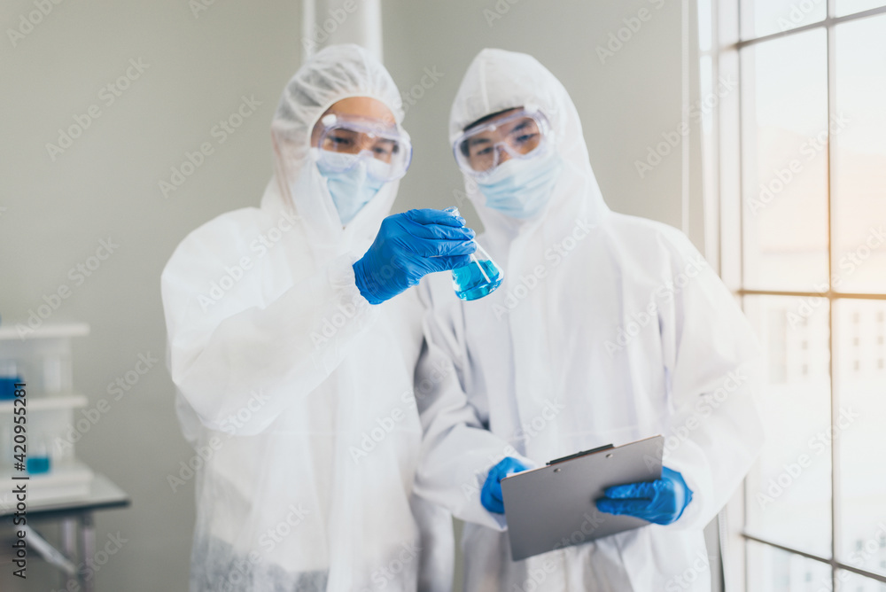 Chemist working for research and testing in laboratory together,Covid-19,Coronavirus vaccine Chemist working for research and testing in laboratory together,Covid-19,Coronavirus vaccine