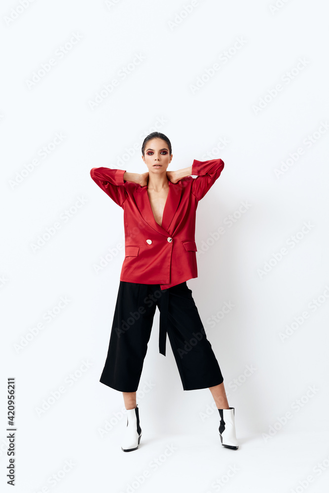 pretty woman in red blazer fashionable clothes yes hands on neck glamor pretty woman in red blazer fashionable clothes yes hands on neck glamor