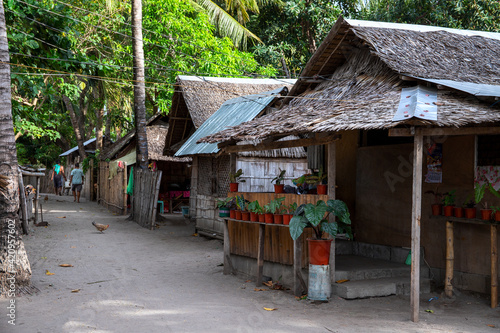 Tablou canvas Rustic wooden huts street asian village