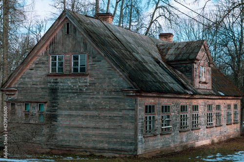  An old uninhabited two-storey wooden building © Ieva