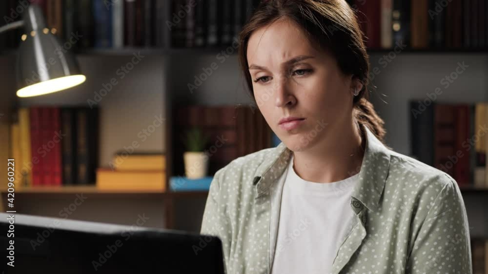 Breathing problems, chest pain. Woman at workplace in evening works at computer and has difficulty breathing, touches chest with her hand. Heart attack, thoracic osteochondrosis, panic attack concept Breathing problems, chest pain. Woman at workplace in evening works at computer and has difficulty breathing, touches chest with her hand. Heart attack, thoracic osteochondrosis, panic attack concept