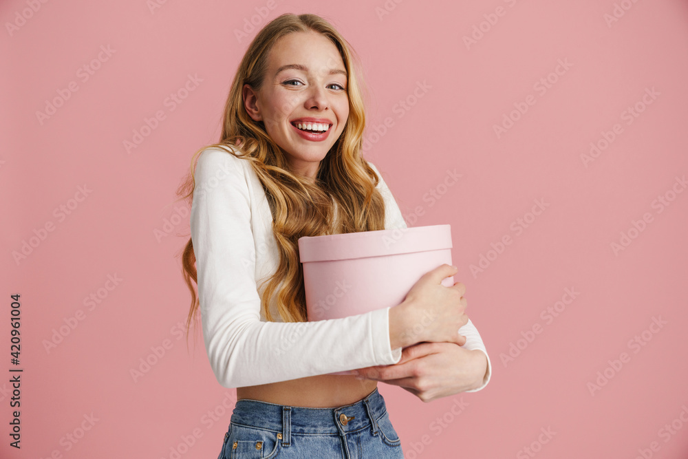 Beautiful happy young blonde woman isolated over pink Beautiful happy young blonde woman isolated over pink