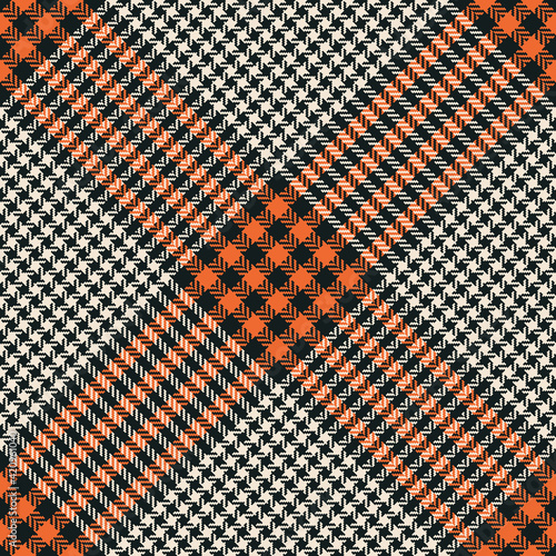 Tartan plaid pattern abstract glen in orange, black, off white. Seamless tweed herringbone check background vector for skirt, blanket, throw, other modern spring autumn winter fashion fabric design.