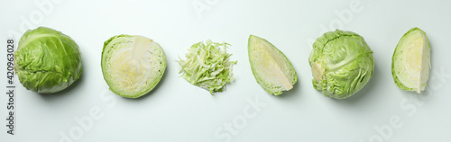Leinwand Poster Fresh green cabbage on white background, top view