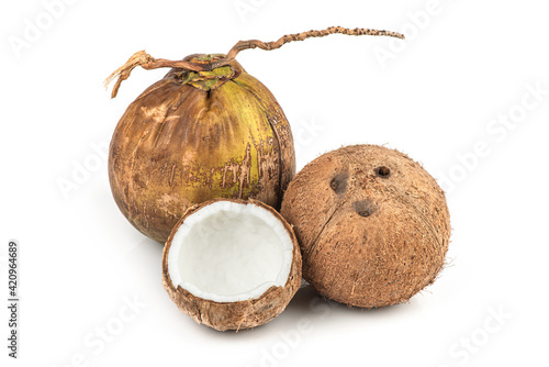 Whole coconut isolated on white background.