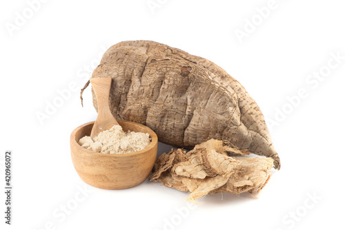 Pueraria mirifica or white kwao krua fruit ,dried slices and powder isolated on background. photo