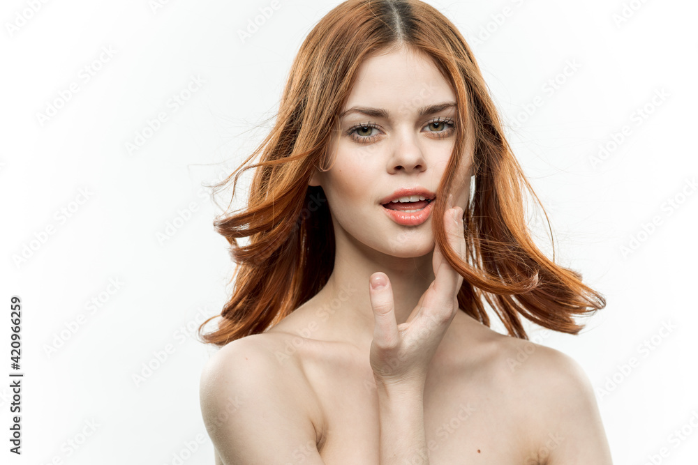 woman with bare shoulders holding hands near face charm fun model woman with bare shoulders holding hands near face charm fun model