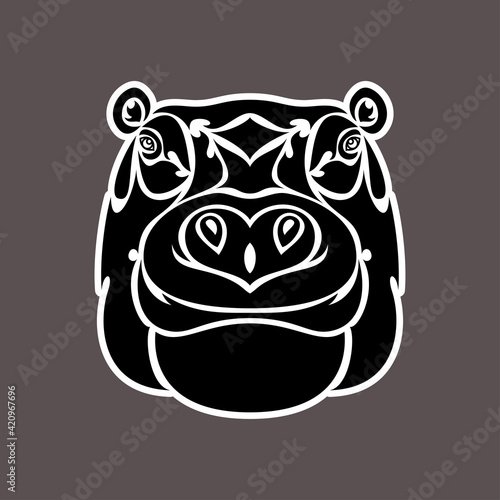 Hand-drawn abstract portrait of a hippo. Sticker. Vector stylized illustration isolated on dark background.