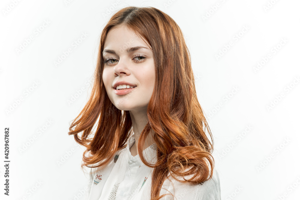 pretty red-haired woman smile cosmetics face closeup light background pretty red-haired woman smile cosmetics face closeup light background