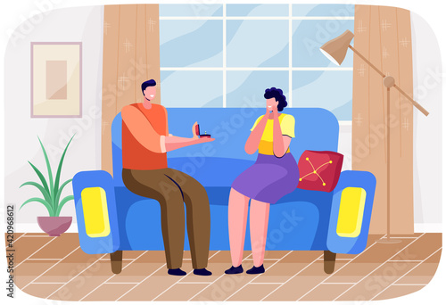 Man sitting on sofa giving woman box with diamond ring. Boyfriend offers marriage to his girlfriend © robu_s