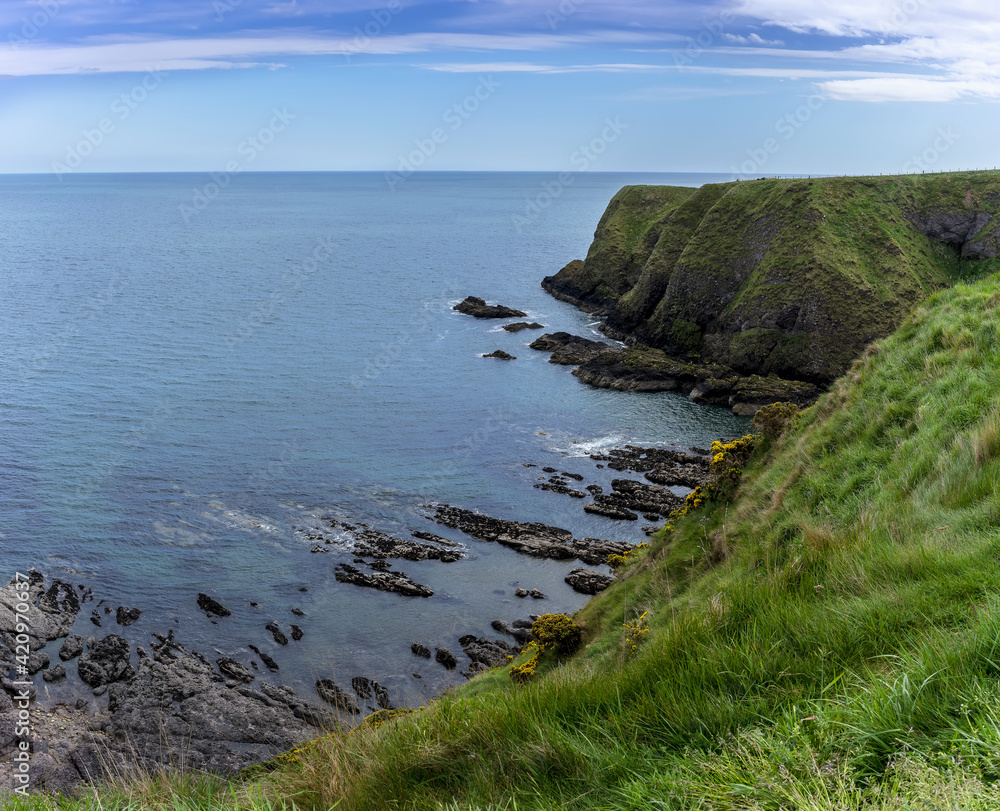 Panoramic image of scenery around Dunnottar Castle , a ruined medieval fortress located upon a rocky headland on the northeastern coast of Scotland
