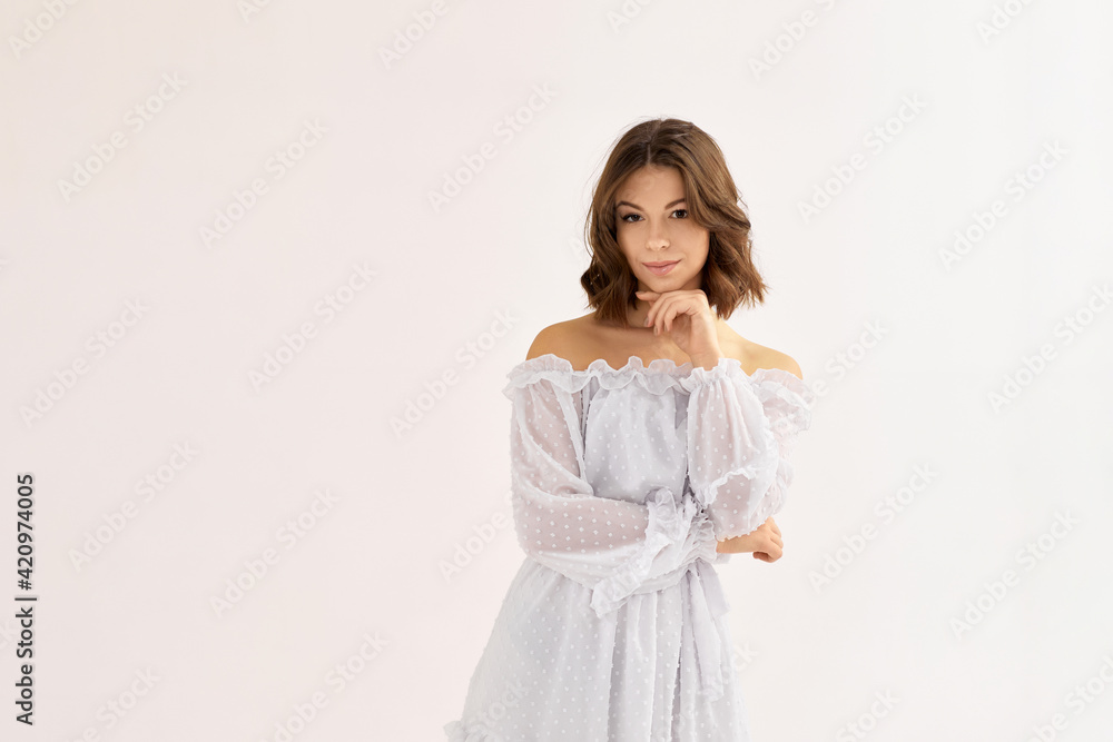 beautiful young brunette woman in white dress beautiful young brunette woman in white dress