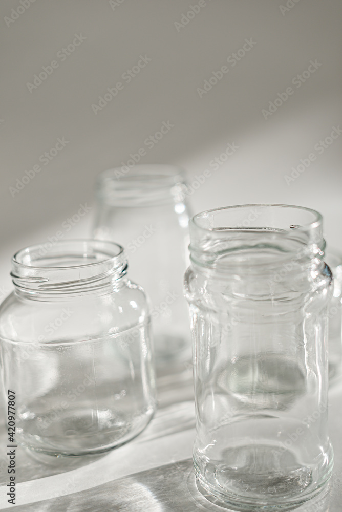 empty jars with shadow on white empty jars with shadow on white