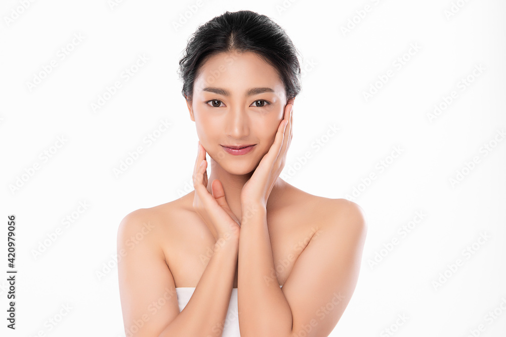 Beautiful young asian woman with clean fresh skin on white background, Face care, Facial treatment, Cosmetology, beauty and spa, Asian women portrait Beautiful young asian woman with clean fresh skin on white background, Face care, Facial treatment, Cosmetology, beauty and spa, Asian women portrait