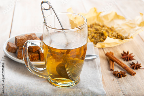 Hot chamomile tea made of wild flowers