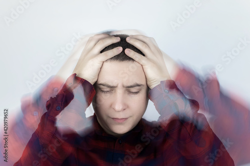 Man loses consciousness and falls down due to dizziness and disturbance of the vestibular apparatus. Severe headache and migraine. Concept of helping people suffering from migraines and dizziness