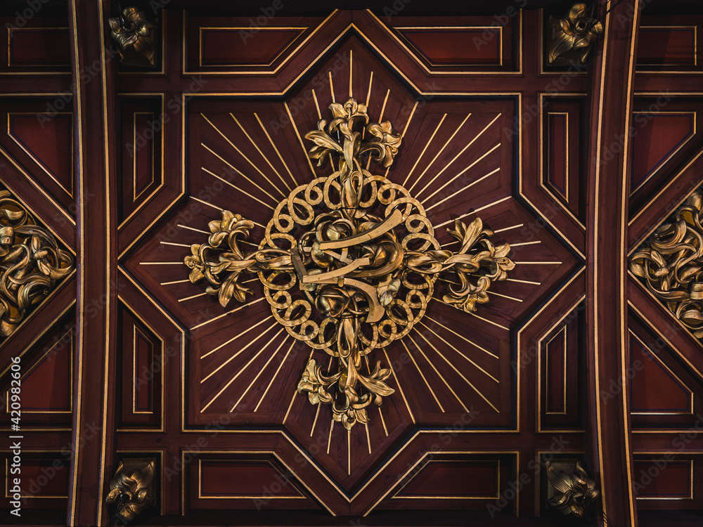 LVIV, UKRAINE - FEBRUARY 10, 2021: The Armenian Cathedral of the Assumption of Mary. Wooden carved ceiling. LVIV, UKRAINE - FEBRUARY 10, 2021: The Armenian Cathedral of the Assumption of Mary. Wooden carved ceiling.