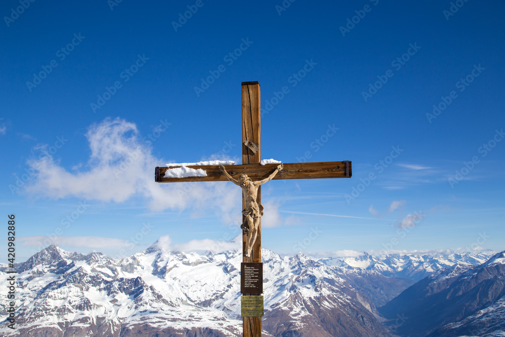 Crucifix on top of mountain Klein Matterhorn in Switzerland Crucifix on top of mountain Klein Matterhorn in Switzerland