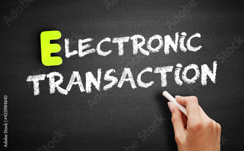 Electronic transaction text on blackboard, concept background
