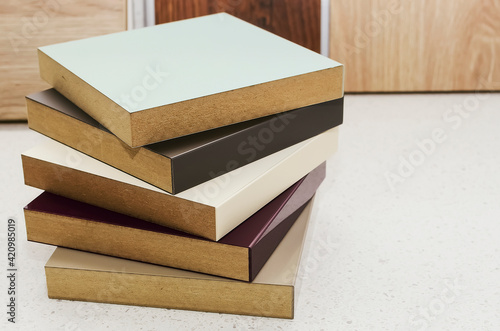 Laminate background. Samples of MDF for flooring and interior design. Production of furniture.