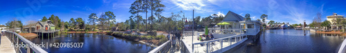 DESTIN, FL - FEBRUARY 2016: Interior of city mall outlet on a beautiful sunny day - Panoramic view © jovannig