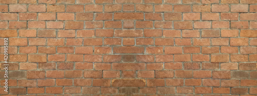 brown brick block wall show Pattern stack block rough surface texture material background Weld the joints with cement grout