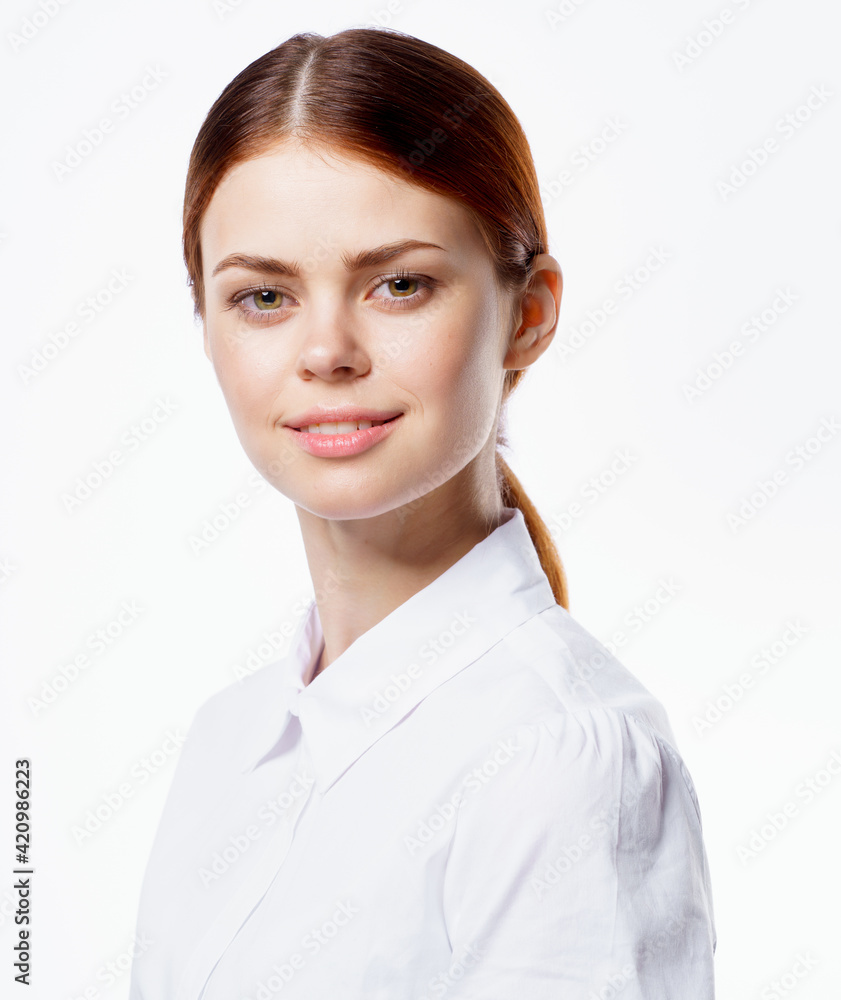 woman in white shirt strict style fashion emotions light background