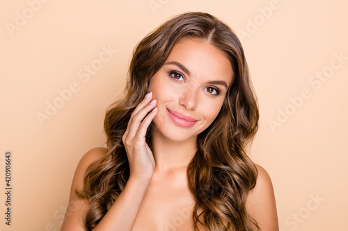 Photo of nice long hairdo optimistic lady without clothes look mirror isolated on pastel beige color background