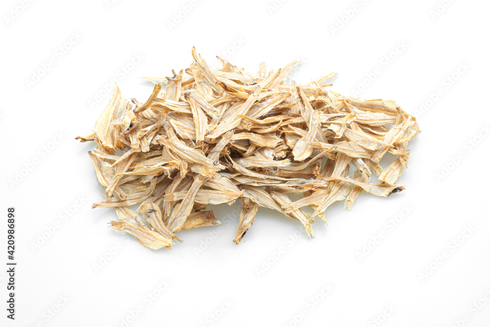 dried small crispy fish on white background