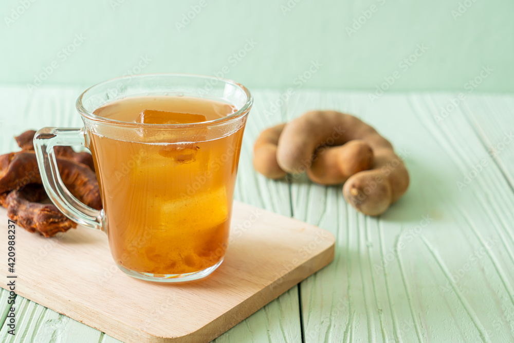 Delicious sweet drink tamarind juice and ice cube Delicious sweet drink tamarind juice and ice cube