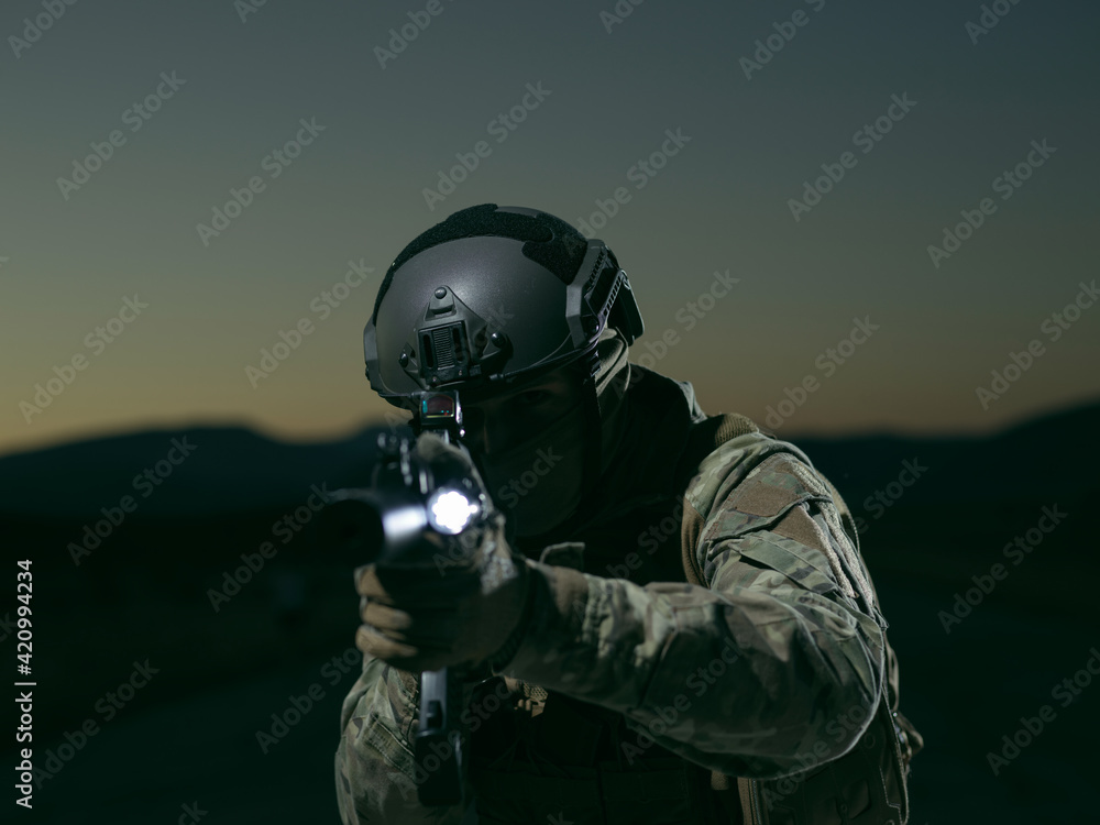 soldier with full combat gear in night mission