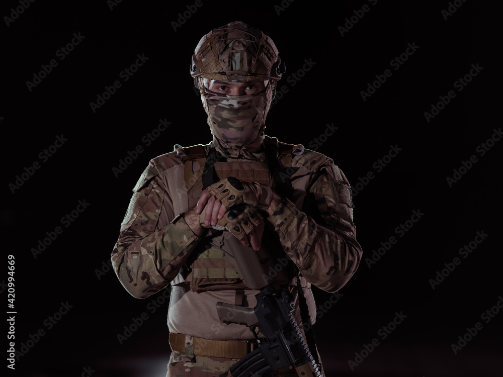 soldier with full combat gear in night mission soldier with full combat gear in night mission