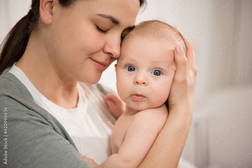 Close up portrait of mother and her newborn baby. Healthcare and medical love woman lifestyle mother s day concept. Close up portrait of mother and her newborn baby. Healthcare and medical love woman lifestyle mother s day concept.