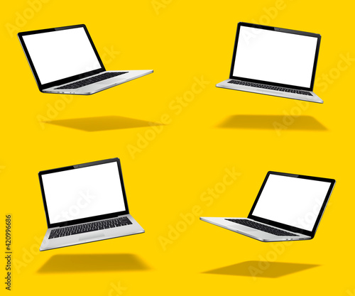 Float or levitate laptop mock up with blank screen isolated