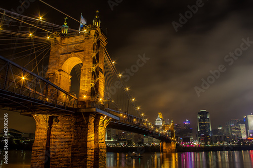 The Roebling Suspension Bridge at night in Cincinnati. photo