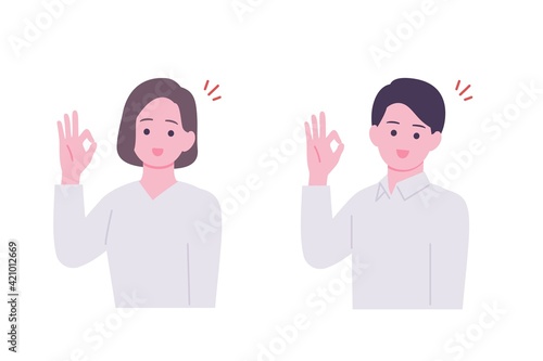 OKサインをする男女